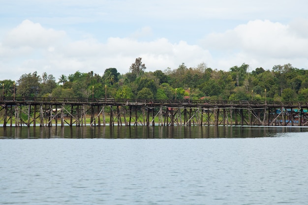 Wooden bridge across the river