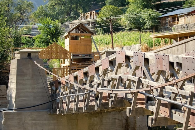 Wooden bridge over the river inKalash valley in Northers Pakistan