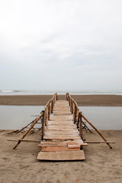 Wooden bridge over the river