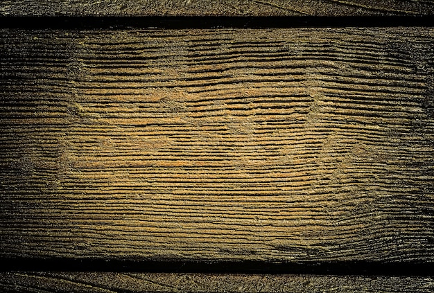 Wooden brown plank texture with black stripes.