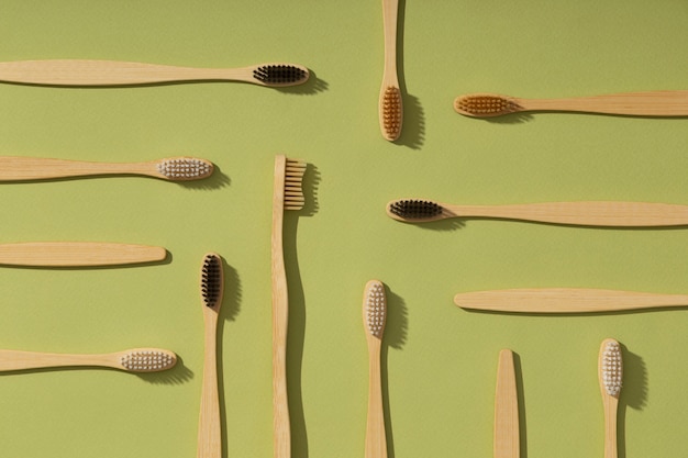 Photo wooden brushes arrangement flat lay