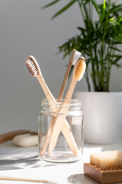 Photo wooden brushes in jar arrangement