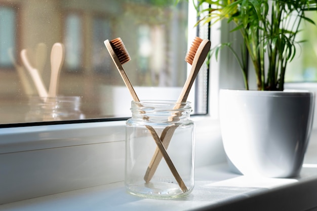 Photo wooden brushes in jar assortment