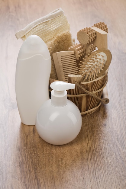 Wooden bucket with white bottles