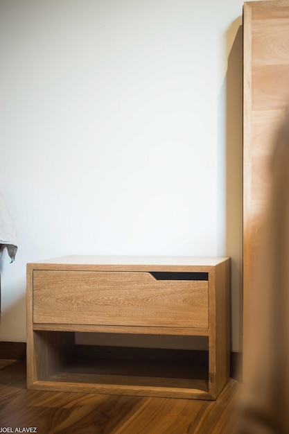 Wooden bureau on top of a rug side table night table