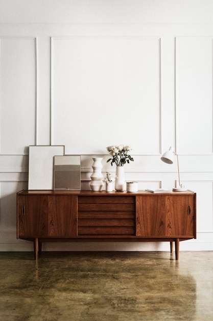 Wooden cabinet against a white wall