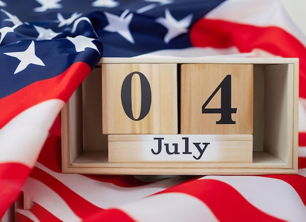 Photo wooden calendar 4th of july with an american flag generative ai