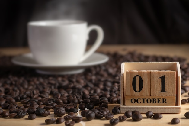 세계 커피의 날 날짜를 보여주는 나무 달력 블록