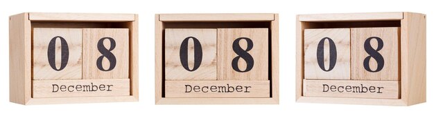 Wooden calendar a set of dates of the month 08 December on a white and transparent background closeup