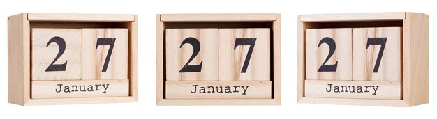 Wooden calendar a set of dates of the month 27 January on a white and transparent background closeup