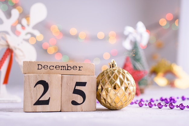 wooden calendar with christmas ornament
