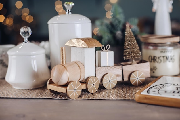 Wooden car carrying a christmas tree. New Year eve concept