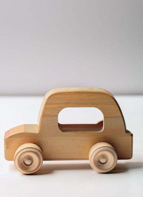 Photo wooden car toy on white background generative ai