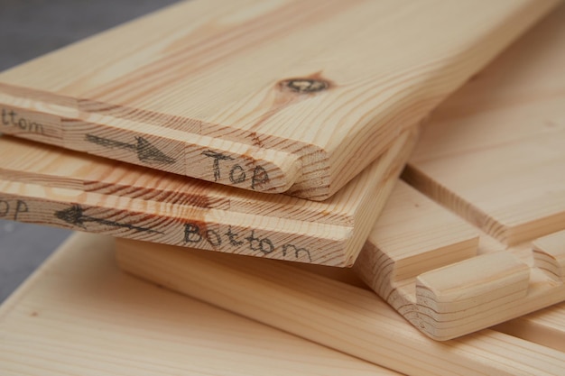 Photo wooden carved blanks detail close-up. wood processing.