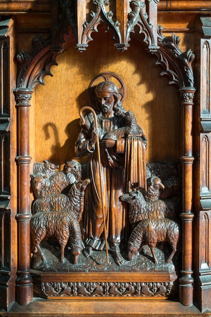 Wooden carving from the pulpit of St Swithun's Church in East Grinstead West Sussex