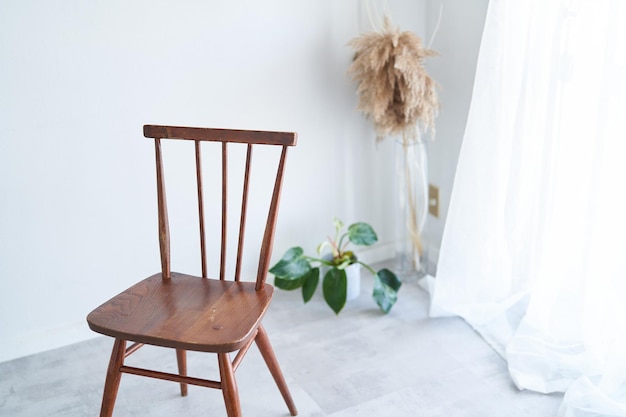 Wooden chair by the window