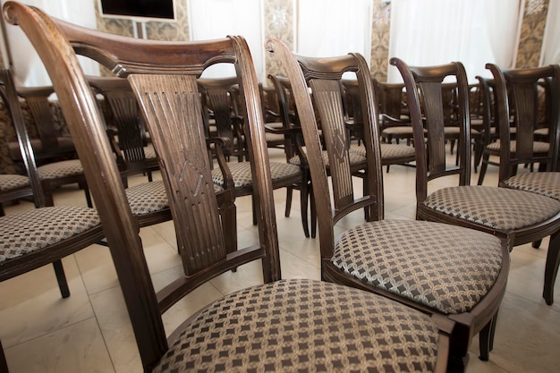 Wooden chairs in the conference room