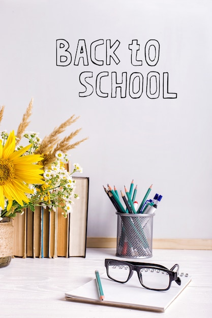 Wooden chalk board frame and vase bouquet on table