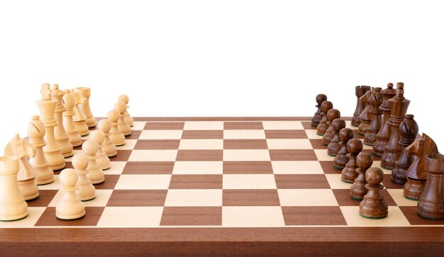 Chess pieces in starting position on a wooden Board Stock Photo by  ©Rostislavv 141334490