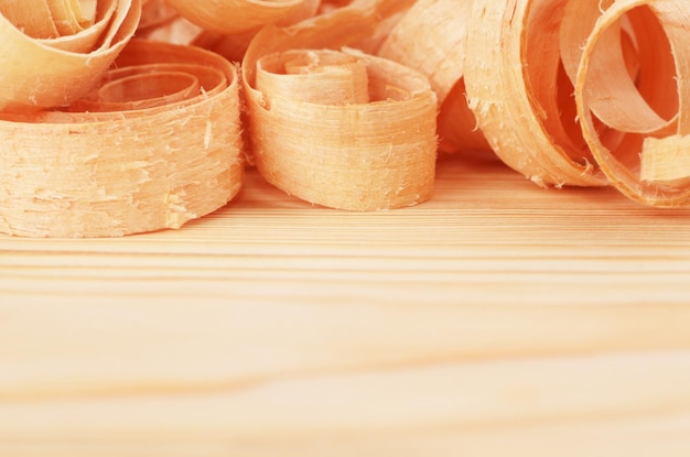 Wooden chips on the natural pine plank