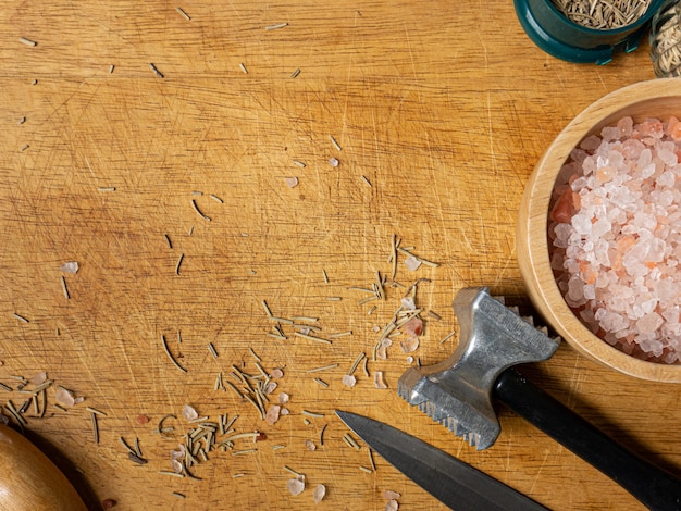 The wooden chopping board  and kitchen equipment top view for food concept