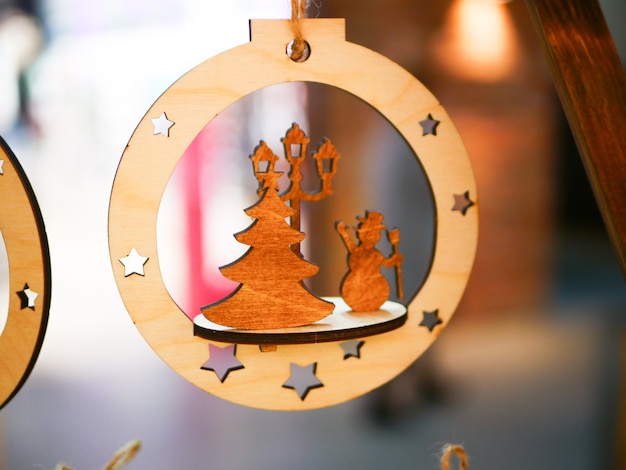 Wooden Christmas retro toy for the Christmas tree handmade. High quality photo