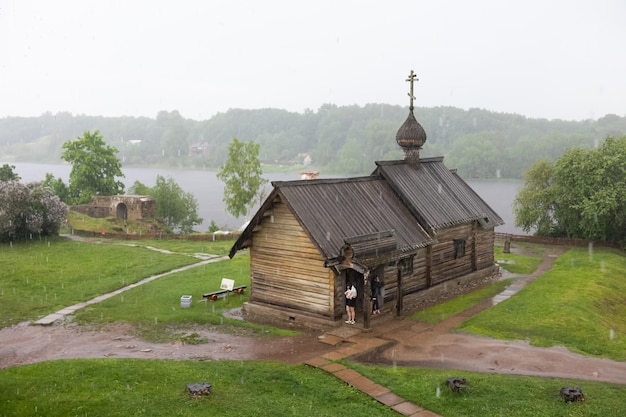 Wooden Church of Demetrius of Thessalonica in Staraya Ladoga in the rain soft focus