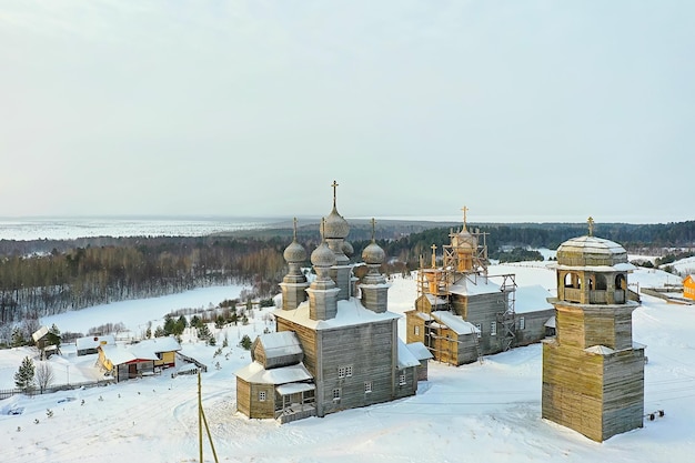 wooden church winter top view, landscape russian north architecture