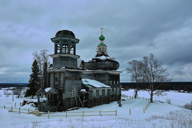 wooden church winter top view, landscape russian north architecture