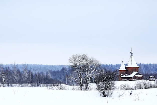 Wooden churches and houses in winter