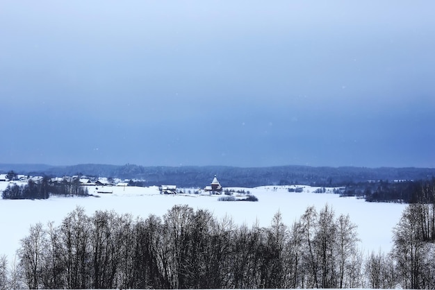 Wooden churches and houses in winter