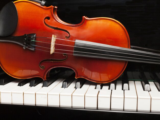 Wooden classic violin on background