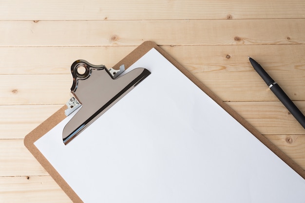 Wooden clipboard on wood 