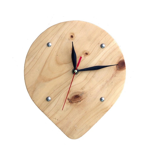 A wooden clock with the hands on the numbers 12 and 12.