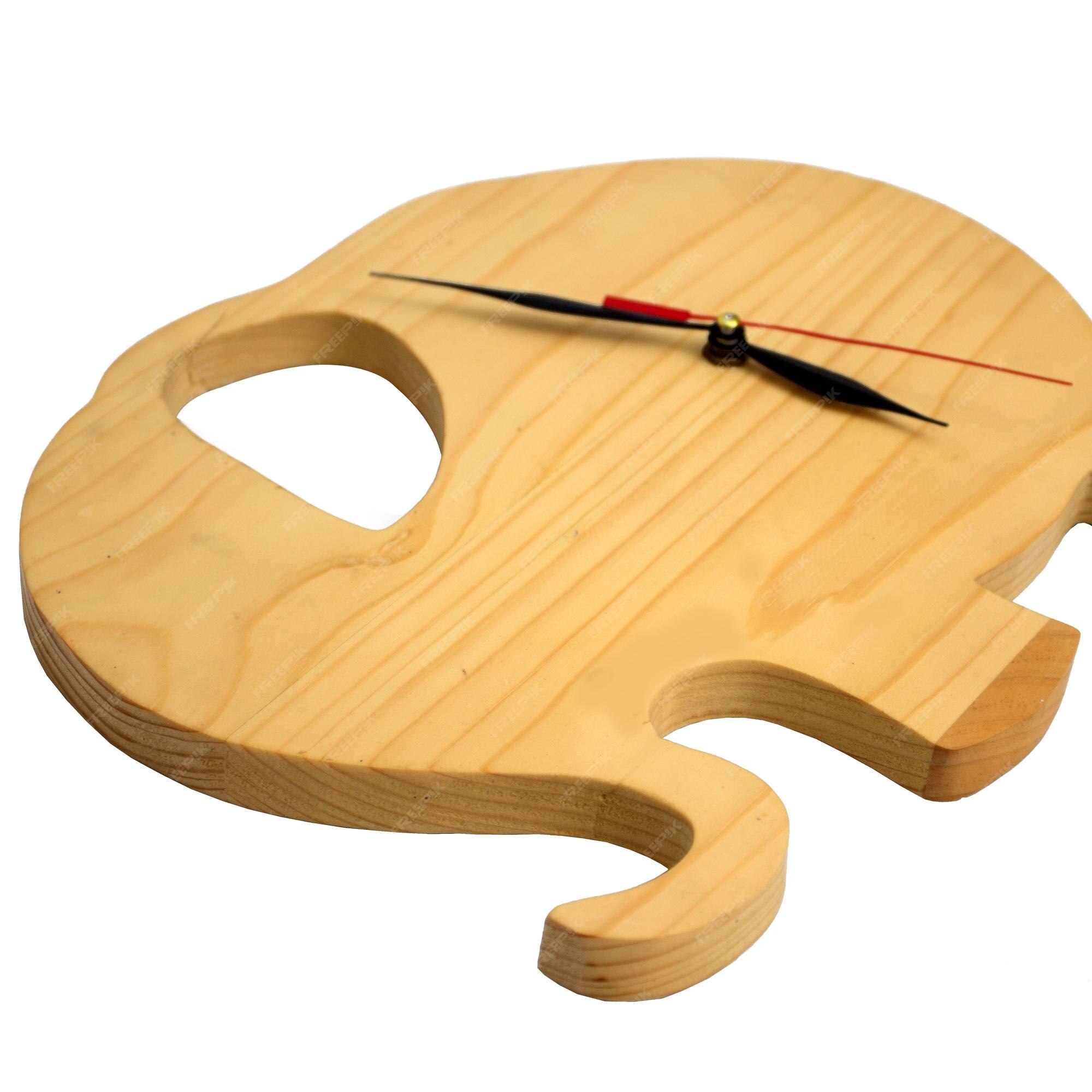 Premium Photo | A wooden clock with a red hand and a red hand on the top.