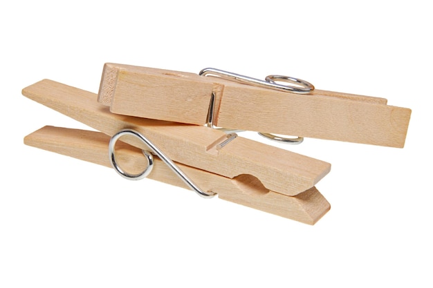 Wooden clothes pegs on a white background