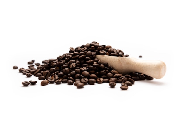 写真 白い背景の正面図に分離された木製のコーヒースプーン
