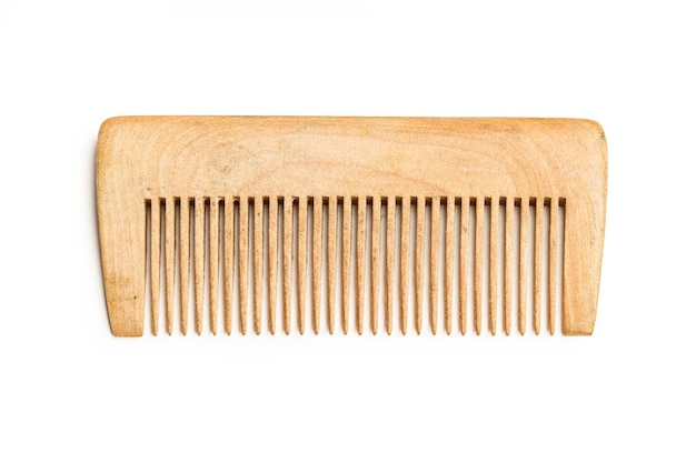 A wooden comb on a white background