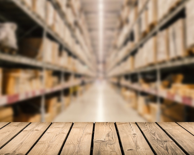 Wooden counter with warehouse blurred background