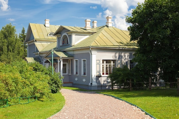 wooden country house with front garden