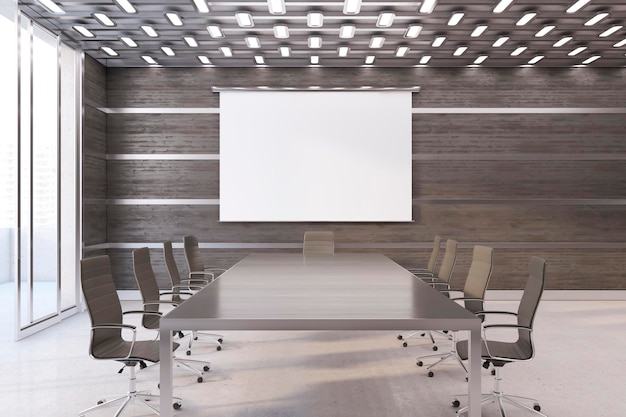 wooden coworking office table with laptops, coffee cups