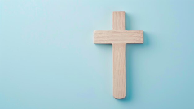 Wooden Cross on Blue Background
