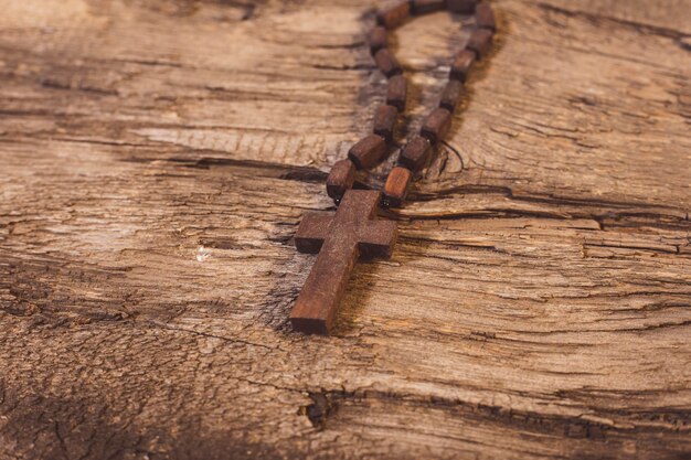 Wooden cross on the table