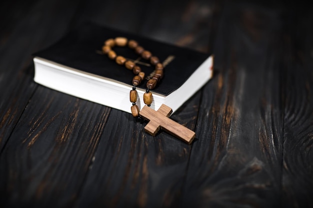 Wooden cross with Bible