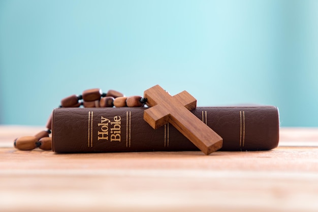 Wooden cross with Holy Bible