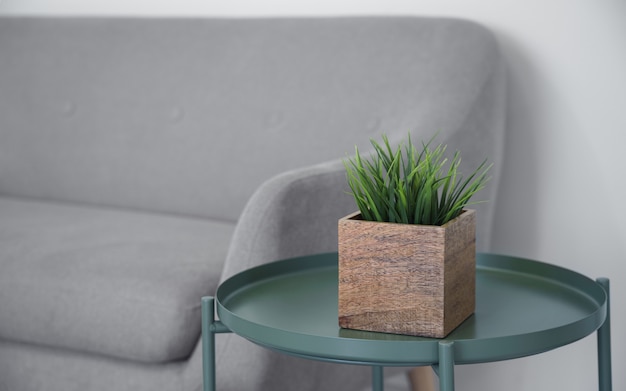 Vaso per piante di legno del cubo sulla tavola moderna del metallo verde