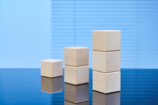 Wooden cubes on a blue background