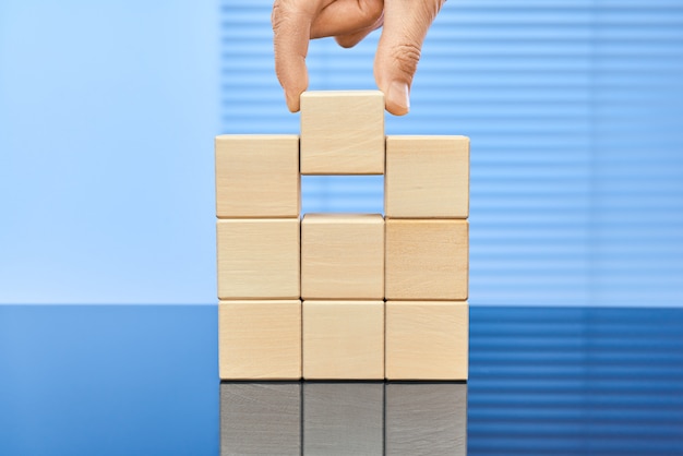 Wooden cubes on a blue background