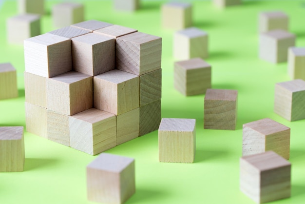 Wooden cubes form a bigger square