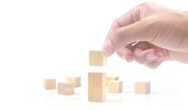 Photo wooden cubes in hand with copy space for input wording